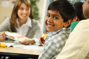 Smiling kid with nutritionist