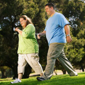 Couple walking in park for exercise