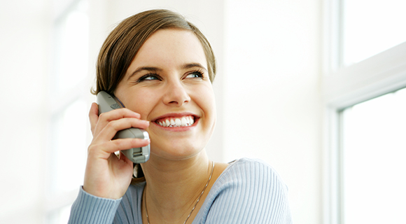 Caucasian woman on the phone smiling