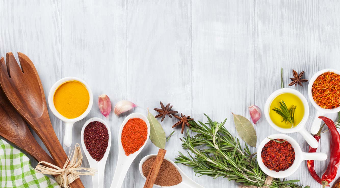 An array of colorful spices and herbs.