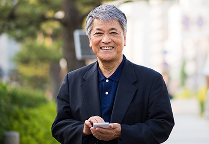 Smiling middle-aged Asian man