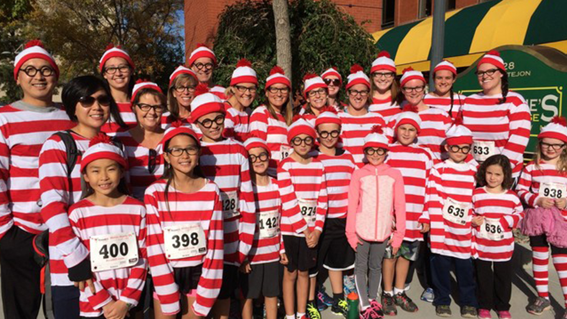 parents and kids dressed as cat in the hat